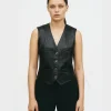 Shop Black Chanel Vest Inspired By Miley Cyrus